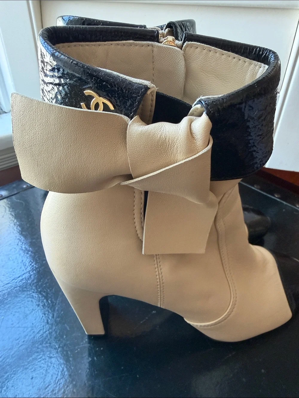 CHANEL Beige and Black Bow Accent Leather Ankle Boots
